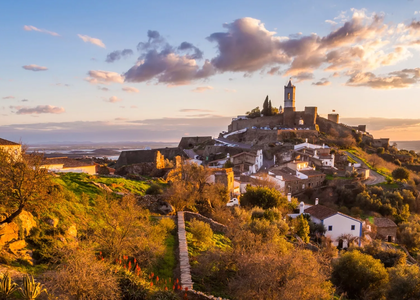 Panoramic view of Monsaraz village and castle at sunset, in the Alentejo region of Portugal.