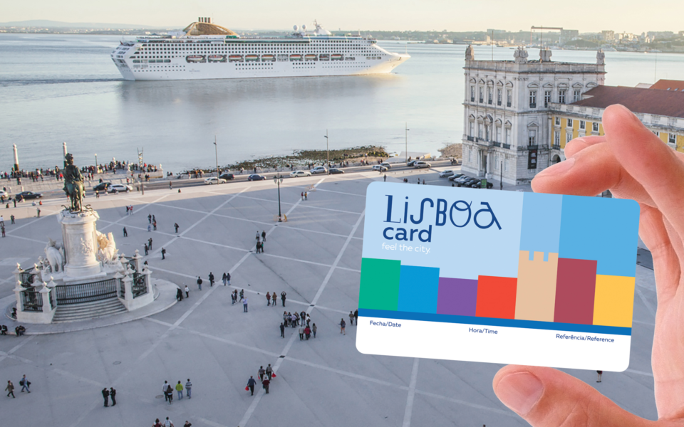 Close-up of a hand gripping the Lisboa Card, representing the ultimate pass for exploring Lisbon's sights and experiences.